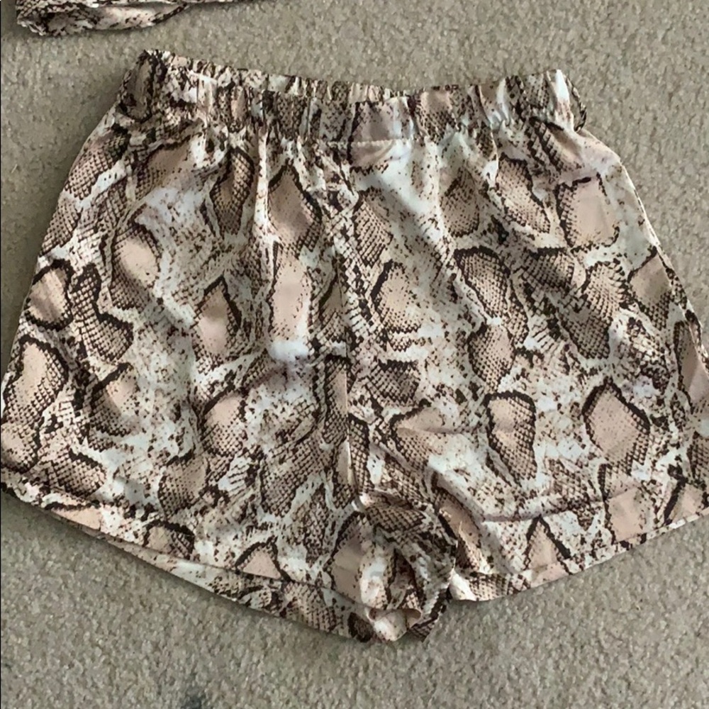 flowy,silk snakeskin shorts with a silk belt